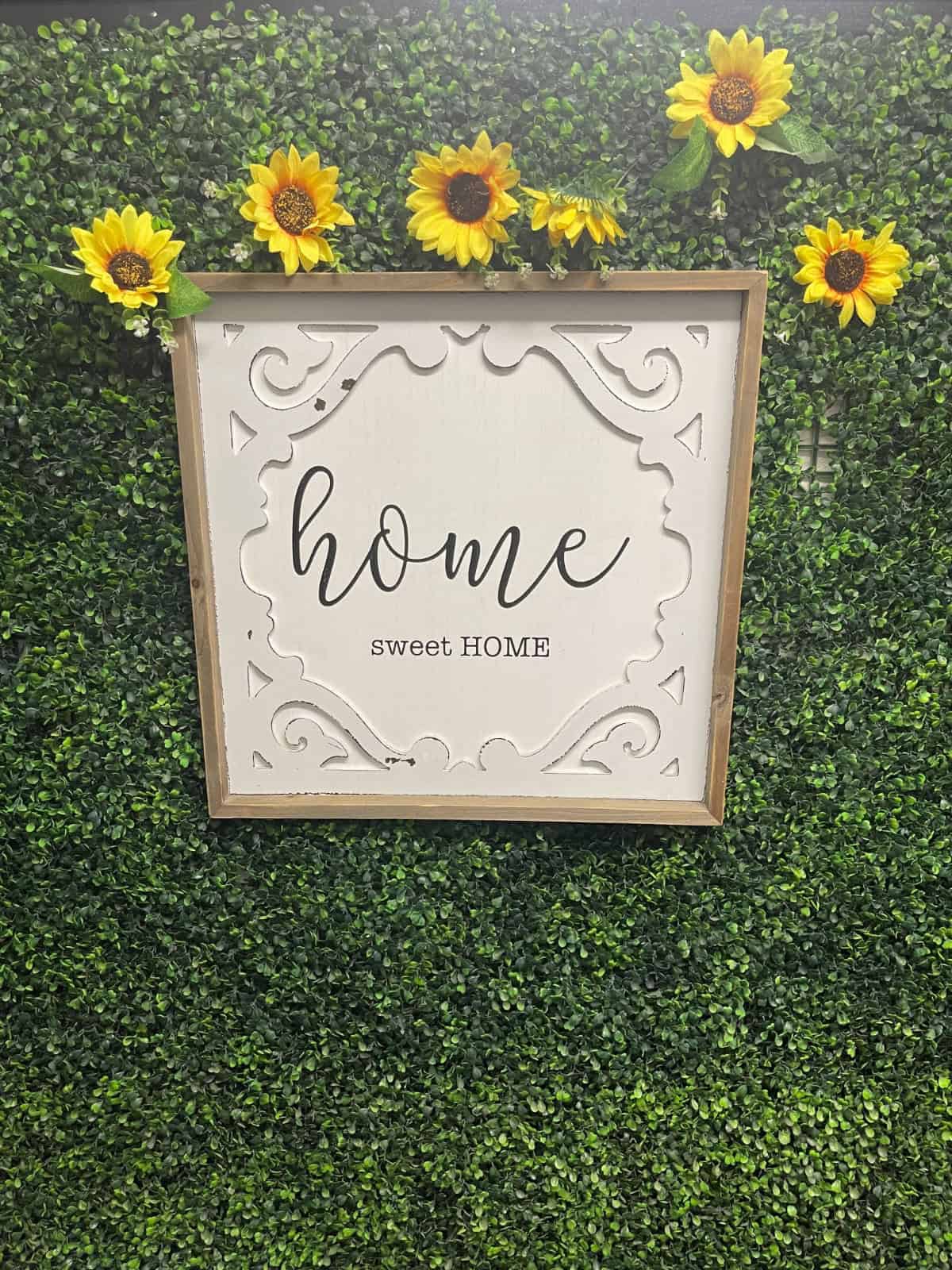 Home sign with flowers at Women and Childrens CrossRoads in Reno