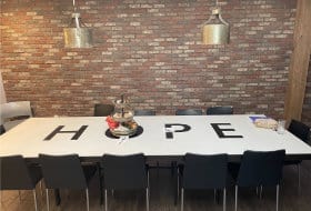 Table with HOPE written on it